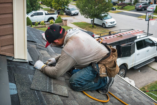 Professional Roof Replacement technician working in La Ward, TX